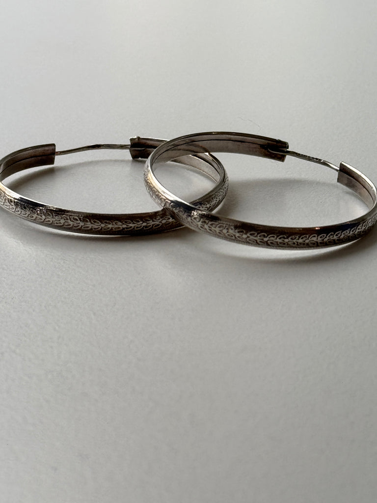 Vintage engraved Sterling silver hoops