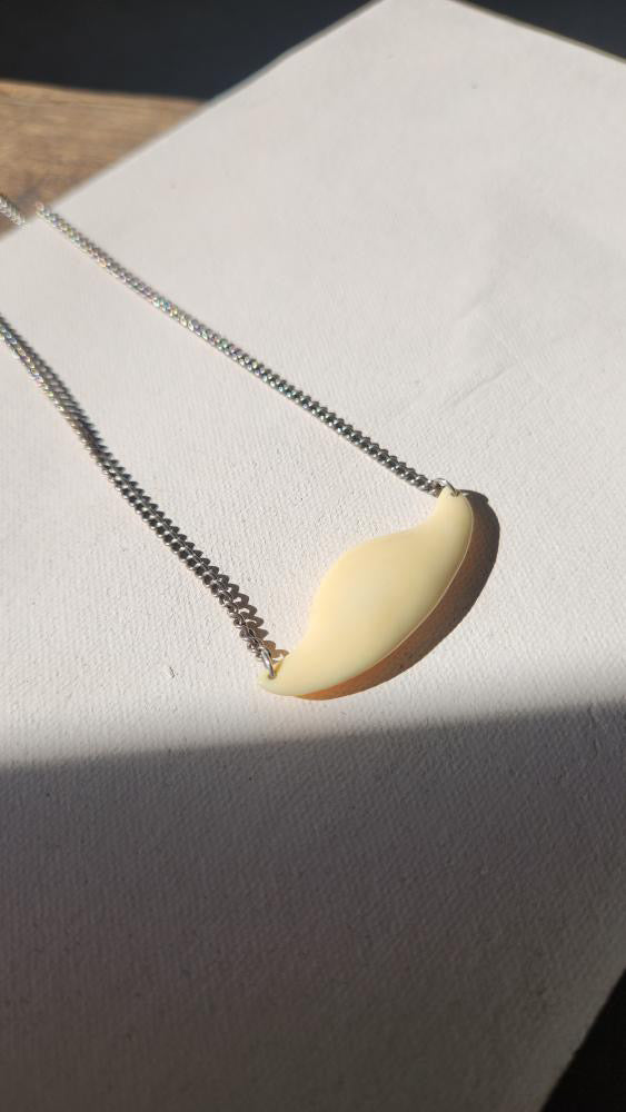 Sterling silver chain with cream pendant