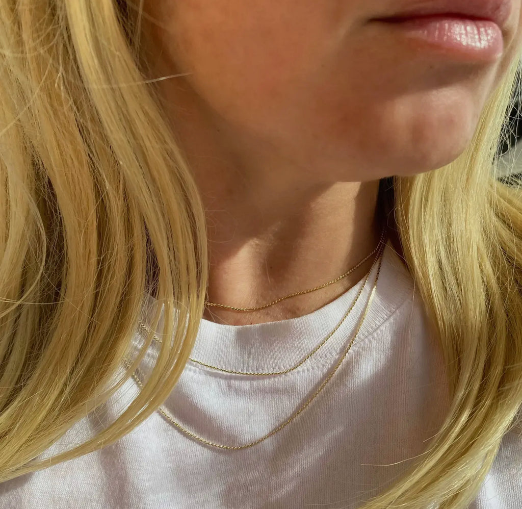 18 kt gold filled dainty chain “18”