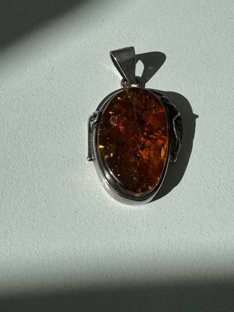 Amber and sterling pendant