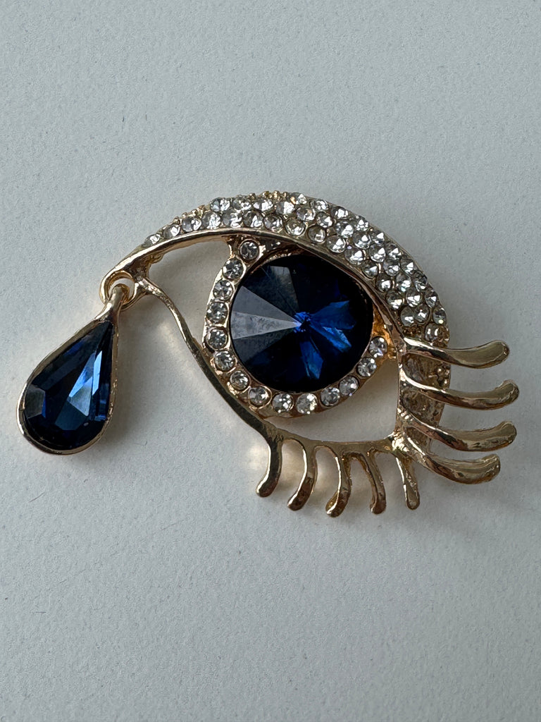 Eye + tear drop pin