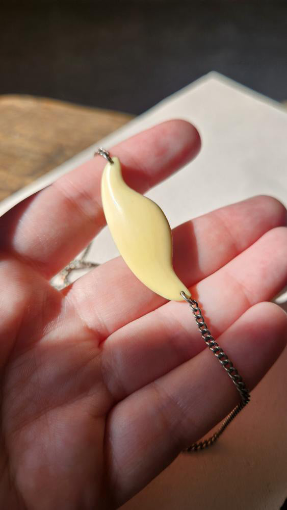 Sterling silver chain with cream pendant