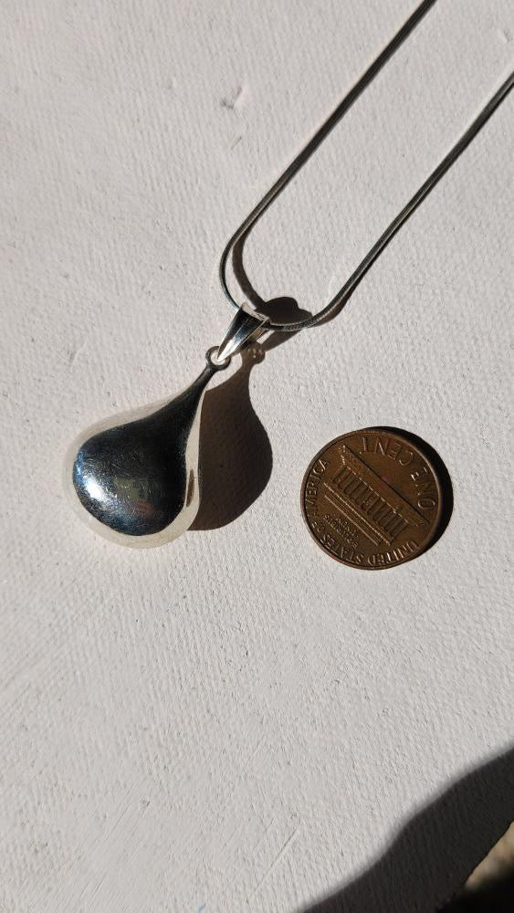 Vintage sterling silver liquid pendant on liquid chain