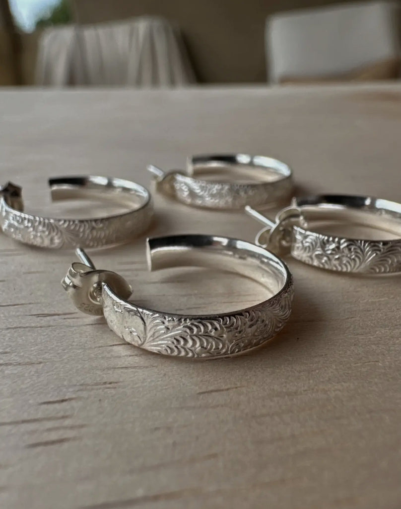Feathered sterling silver hoops