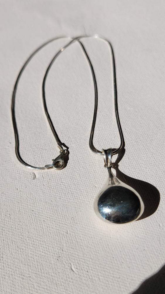 Vintage sterling silver liquid pendant on liquid chain