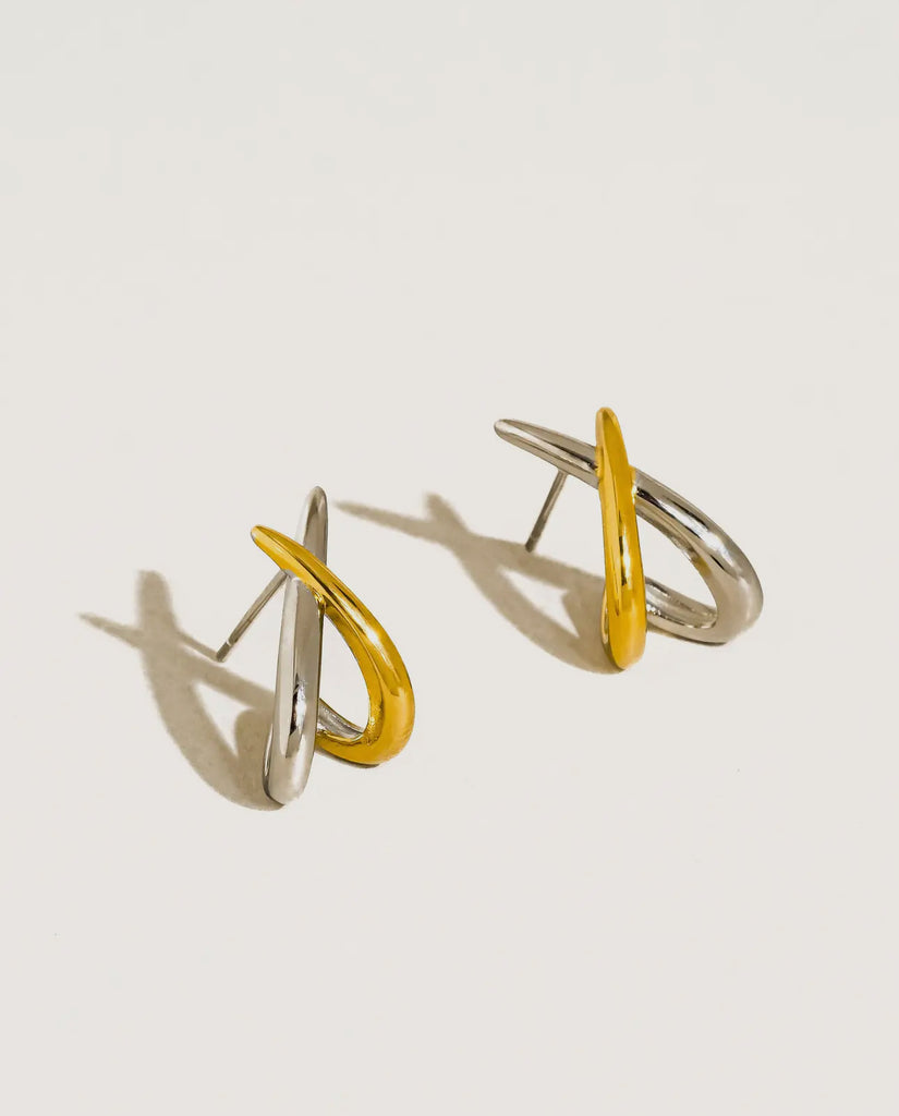 Two toned cross over earrings