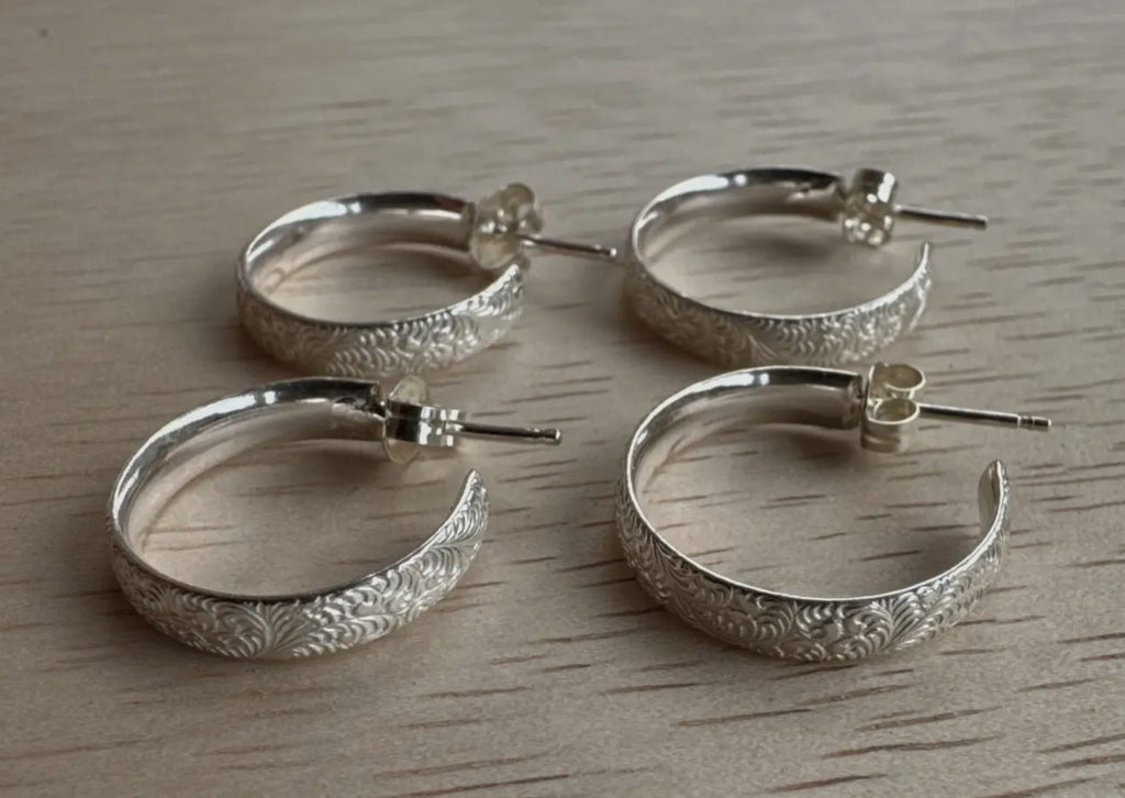 Feathered sterling silver hoops