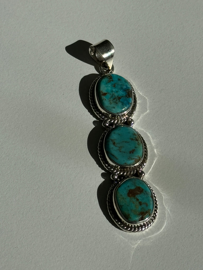 Long triple turquoise pendant