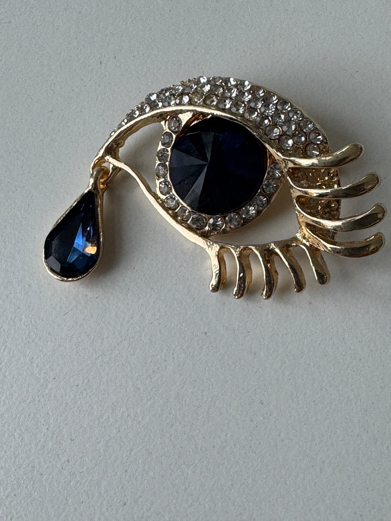 Eye + tear drop pin