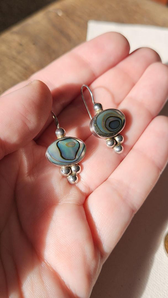 abalone teardrop earrings with dot detailing