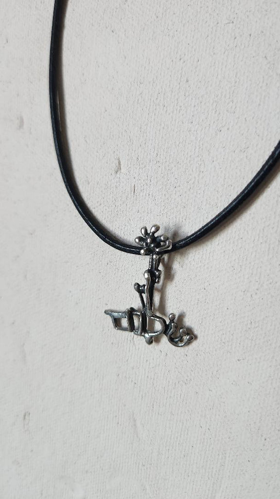 Vintage abstract artisan pendant on cord