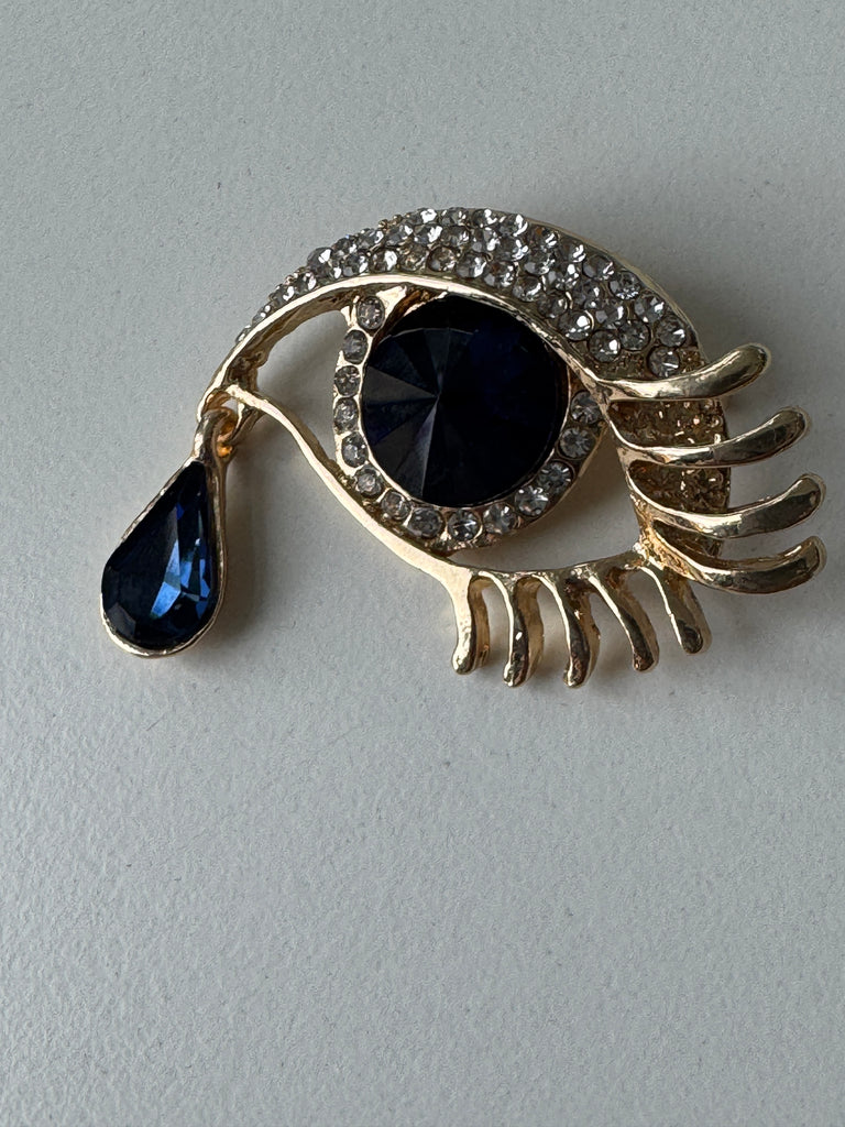 Eye + tear drop pin
