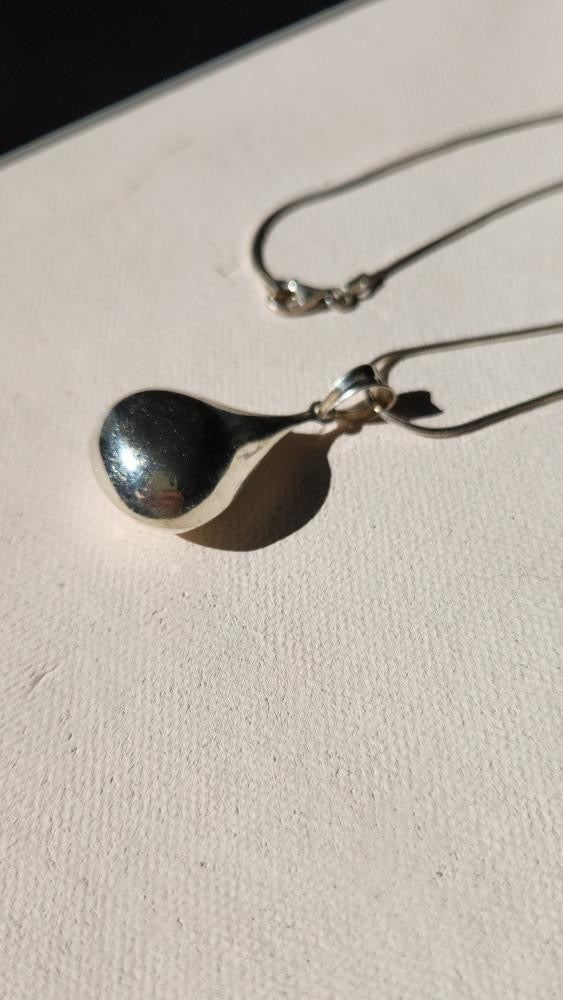Vintage sterling silver liquid pendant on liquid chain