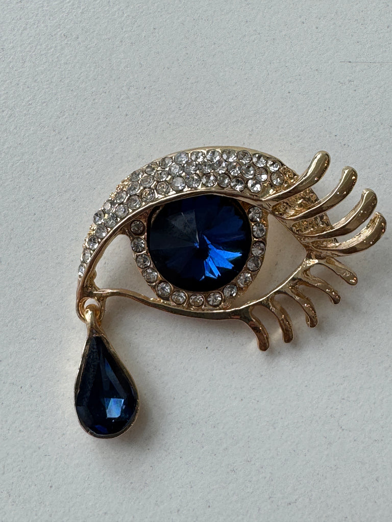 Eye + tear drop pin