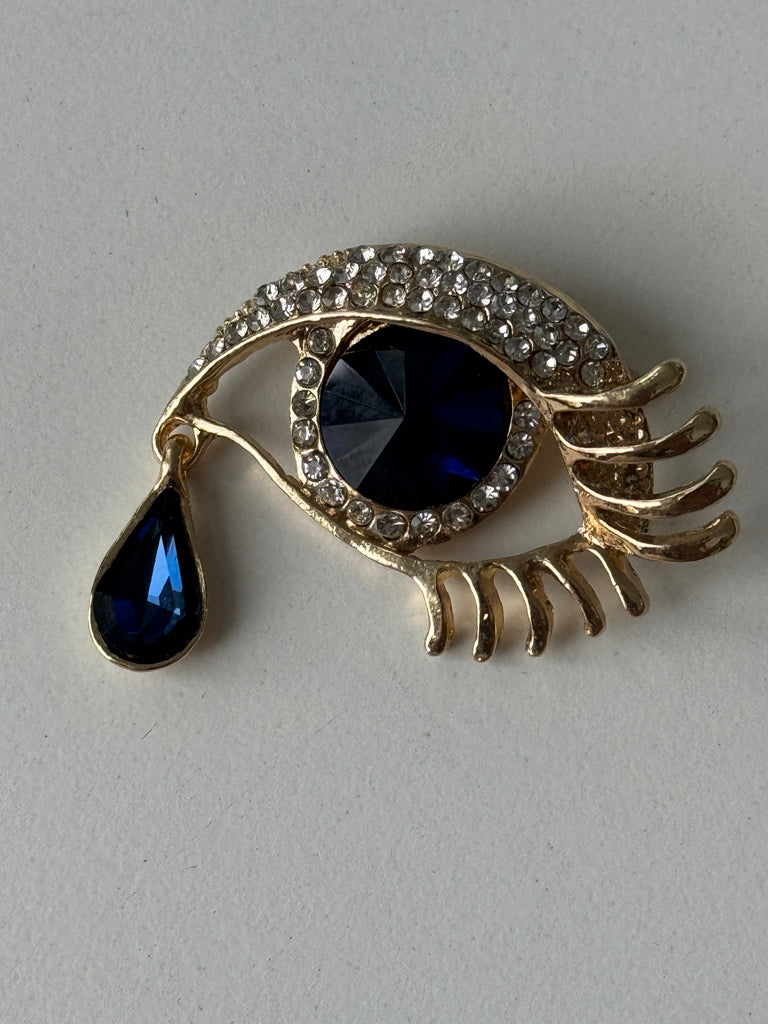 Eye + tear drop pin