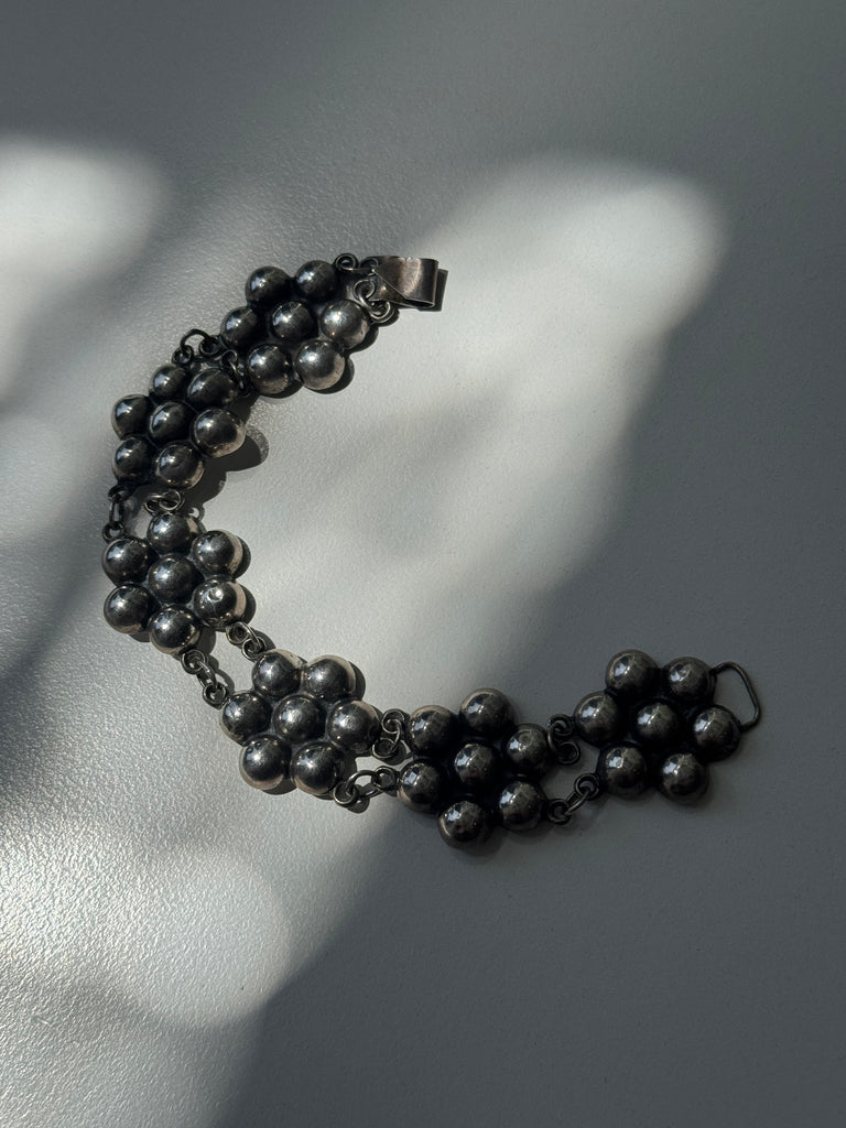 Floral bubble rise sterling silver bracelet