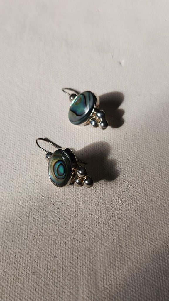 abalone teardrop earrings with dot detailing