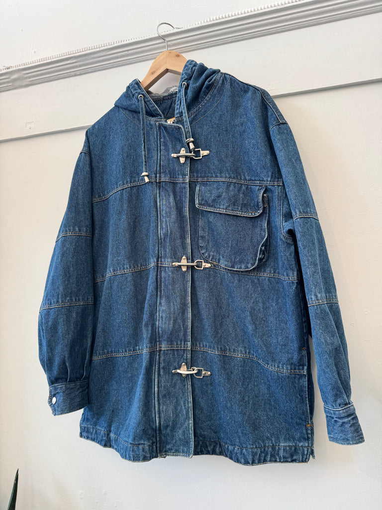 Vintage denim jacket with metal hardware