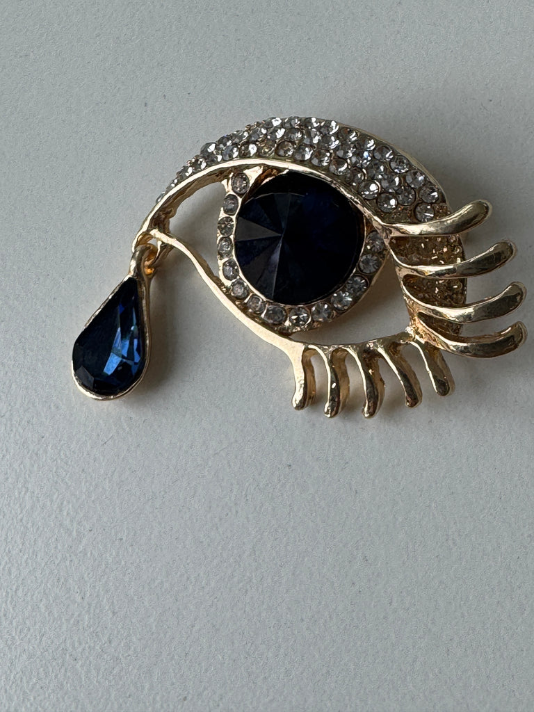 Eye + tear drop pin