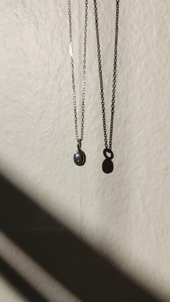 Sweetest sterling oval vintage Droplet charm necklace