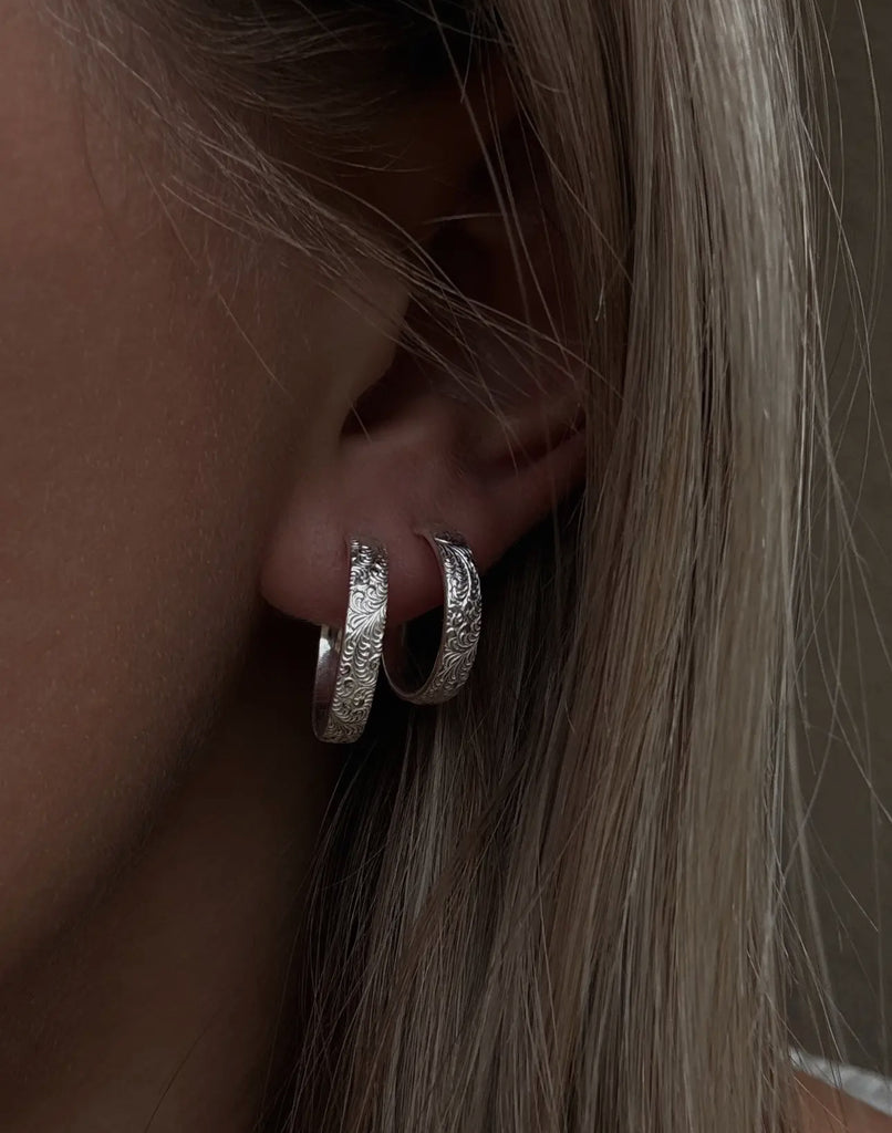 Feathered sterling silver hoops