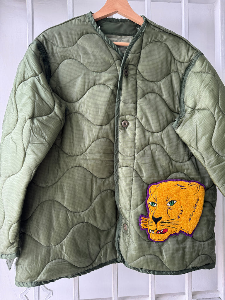 Vintage quilted jacket with vintage patch