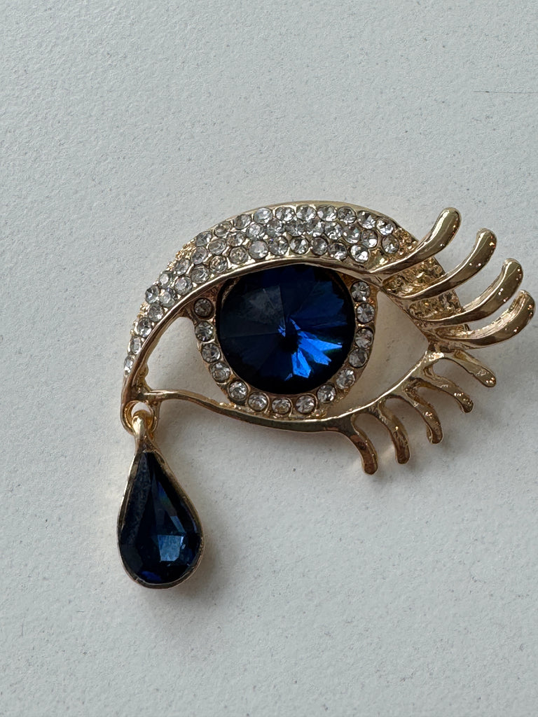 Eye + tear drop pin