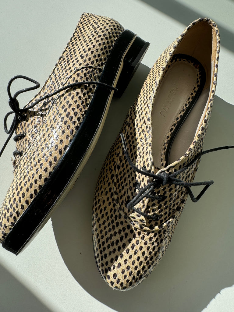 Designer Jason Wu snake skin shoes