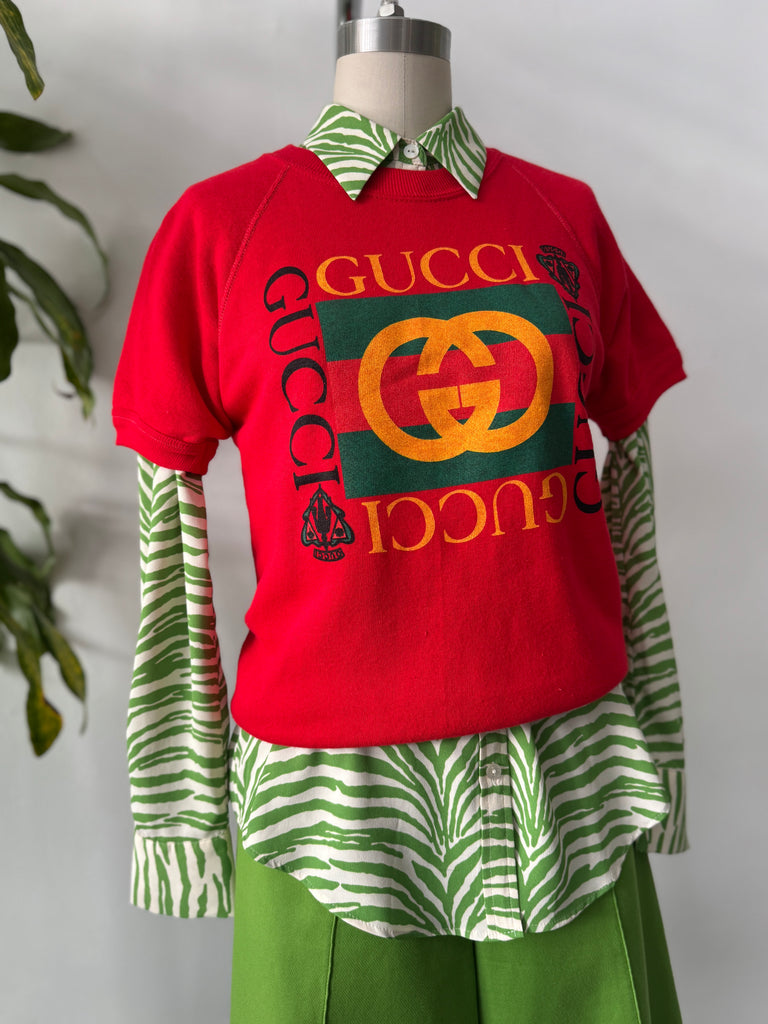 Green zebra print button up top