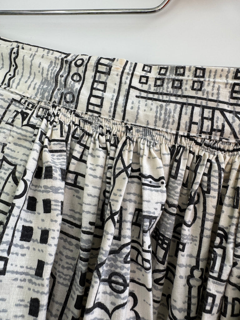 Vintage city scene novelty print skirt “28/29”