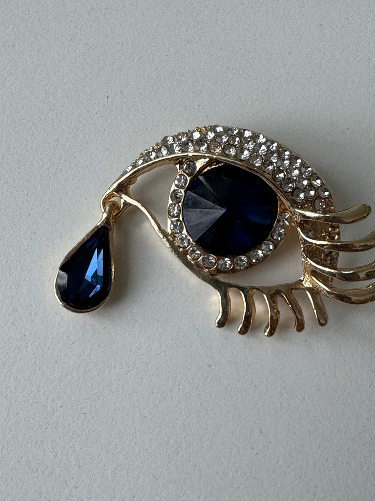 Eye + tear drop pin