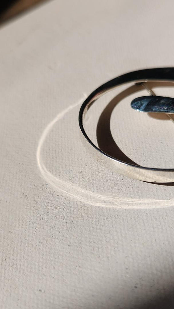 Vintage Sterling swirl brooch