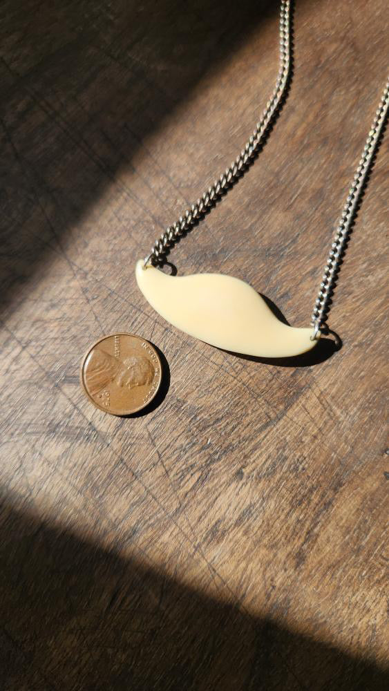 Sterling silver chain with cream pendant